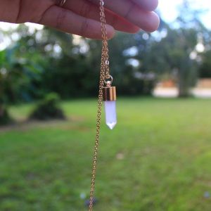 Pale pink bullet shaped stone necklace